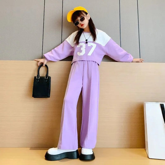 AO0508-83 طقم بناتي سبورت ( بلوزة + بنطلون)